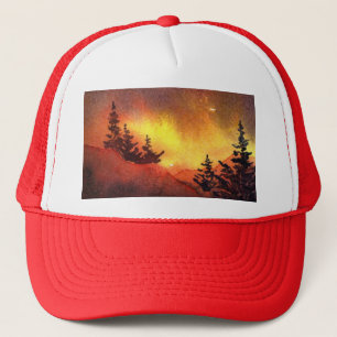 Landendenbomen op een heuvel met een zonnebrand trucker pet