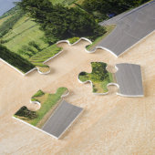 Landenstreep tussen cyperbomen in legpuzzel (Zijkant)