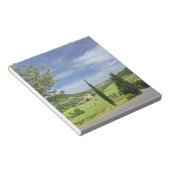 Landenstreep tussen cyperbomen in notitieblok (Schuin)