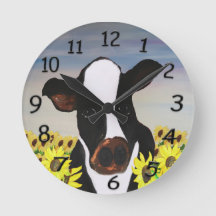 Landklok voor koe en zonnebloemen