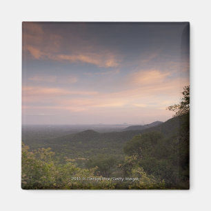 Landschap onder zonsondergang magneet
