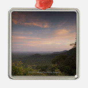 Landschap onder zonsondergang metalen ornament