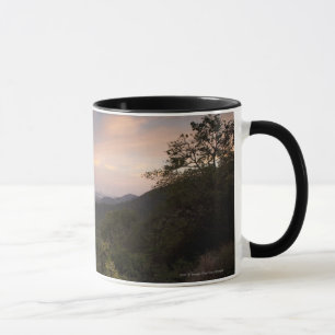 Landschap onder zonsondergang mok