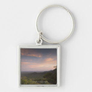 Landschap onder zonsondergang sleutelhanger