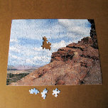 Landschapsfoto Noord-raam Arch Utah Legpuzzel<br><div class="desc">Dit uitzicht van en door de noordpoolboog werd meegenomen in het Arches National Park bij Moab, Utah. Het gesteente dat het onderste recht van de boog vormt vult bijna de helft van het lijst op diagonaal. Aan zijn linkerzijde, domineren de witte puffige wolken de blauwe hemel die het hogere gedeelte...</div>