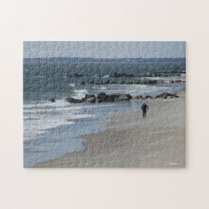 Lange winterwandelingen op het strand legpuzzel