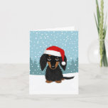 Langharige Zwart en Tan Dachshund Kerstmis Feestdagen Kaart<br><div class="desc">Deze schattige kerstkaart is ideaal voor langharige zwarte en geelbruine teckel liefhebbers! Het handgetekende afbeelding van de feestelijke en liefdevolle wiener dog met een kerstmuts legt de speelse spirit van de feestdagen vast. Pas de binnenkant aan met je eigen doordachte sentimenten om dit seizoen de vreugde te verspreiden naar iedereen...</div>