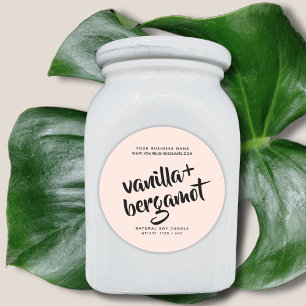 Langs de dunne, lichtroze kaarsenetiket ronde sticker