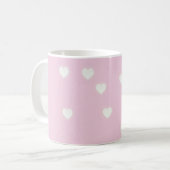 Langwerpige witte harten op roze koffiemok (Voorkant links)