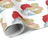lapjespop en teddybeer op wit cadeaupapier (Rol Hoek)