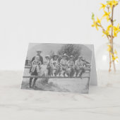 Larry Larom met zes kinderen op een omheining Kaart (Gele Bloem)