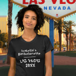 Las Vegas Bachelorette Zwart Naam T-shirt<br><div class="desc">Dit gepersonaliseerde zwarte t-shirt is voorzien van de naam van de vrijgezel in leuke witte typografie. Geweldig voor je meisjes avondje uit in Las Vegas. Als u de tekst wilt wijzigen,  klikt u op de knop personaliseren.</div>