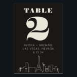 Las Vegas Casino Skyline Wedding Kaart<br><div class="desc">Een leuke en moderne Las Vegas Casino Skyline Trouwtafel nummer kaart die een aangepaste touch zal toevoegen aan uw evenement in Las Vegas! Dit nummer van de trouwtafel is voorzien van een moderne rendering van de skyline van Las Vegas en volledig aanpasbaar lettertype en tekst op een grafietzwarte achtergrond. Ideaal...</div>