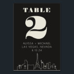Las Vegas Casino Skyline Wedding Kaart<br><div class="desc">Een leuke en moderne Las Vegas Casino Skyline Trouwtafel nummer kaart die een aangepaste touch zal toevoegen aan uw evenement in Las Vegas! Dit nummer van de trouwtafel is voorzien van een moderne rendering van de skyline van Las Vegas en volledig aanpasbaar lettertype en tekst op een grafietzwarte achtergrond. Ideaal...</div>