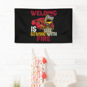 Lassen is als naaien met vuur spandoek (Insitu)