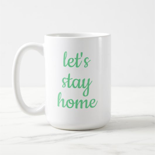 "Laten we thuisblijven" Koffiekoffie-Mok Koffiemok (Links)