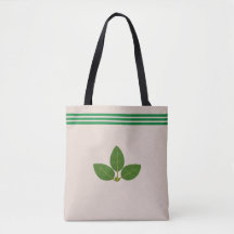 Laurierplant op groene en beige boodschappentas