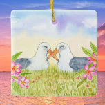 Laysan Albatross with Pink Plumerias Keramisch Ornament<br><div class="desc">Celebrate connection and lasting beauty with this elegant watercolor ornament featuring two graceful albatross framed by delicate pink plumeria blossoms. The peaceful island-inspired design symbolizes harmony,  companionship,  and shared journeys,  creating a meaningful decorative keepsake that adds warmth,  serenity,  and heartfelt sentiment to any home or holiday display.</div>