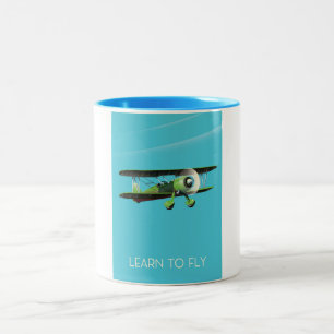 Lean To Fly vintage vliegtuigposter Tweekleurige Koffiemok