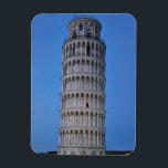 Leaning Tower at Dusk Magneet<br><div class="desc">This captivating photograph showcases the iconic Leaning Tower of Pisa standing elegantly against a deep blue twilight sky in Pisa. The historic marble tower, famous for its unmistakable tilt, is beautifully illuminated, highlighting its intricate Romanesque arches and layered columns. The soft evening light creates a striking contrast between the glowing...</div>