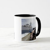 Leden van het bezoek, de raad van bestuur, de huis mok (Voorkant rechts)