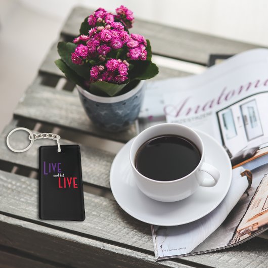 Leef en laat live spreekwoord zwart sleutelhanger