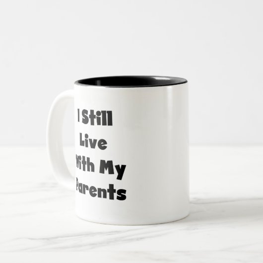 Leef nog steeds met ouders tweekleurige koffiemok (Voorkant links)