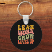 Leer werk Grow Level Up Retro Groovy Motivatie Sleutelhanger (Voorkant)