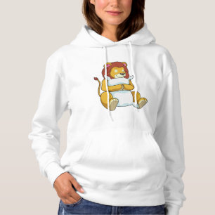 Leeuw bij het slapen met een piloot hoodie