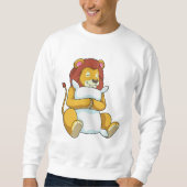 Leeuw bij het slapen met een piloot trui (Voorkant)