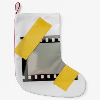 Lege 35mm film lijst, gele strips. kleine kerstsok