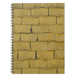 Lege betonnen muur notitieboek