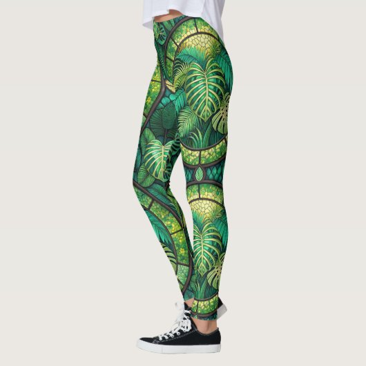 Leggings featuring a vibrant green tropical leaf  (Links)