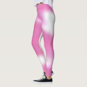 Leggings met een abstract roze en wit ontwerp (Links)