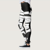 leggings met een gele zwarte kattenmummijn (Links)