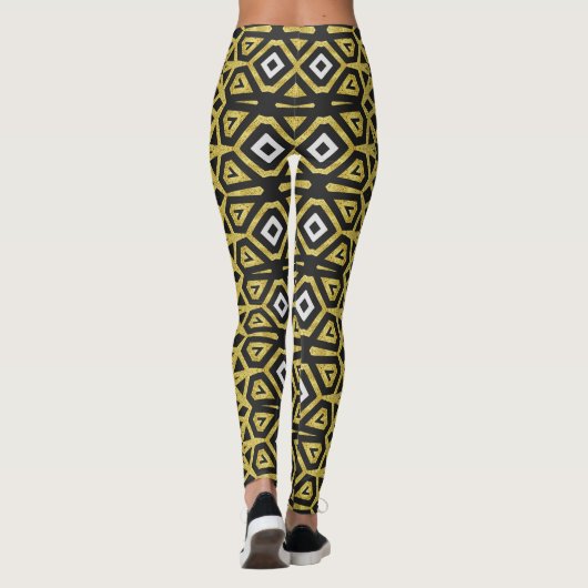 Leggings met een zwart en goudpatroon ★ Funky Trib (Achterkant)