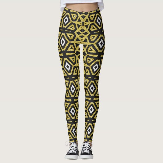 Leggings met een zwart en goudpatroon ★ Funky Trib (Voorkant)