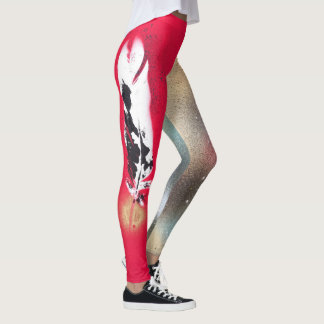 Leggings met rode en goudveren prints