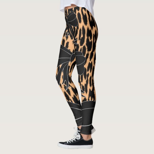 Leggings van de zwarte leoparboog (Links)