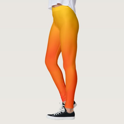 Leggings van het Sunset Oranje en Gellow Gradient  (Links)