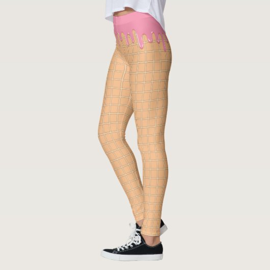 Leggings van roze ijssmelterijtjes op weekwafels (Links)
