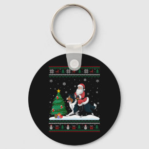 Lelijke kerstboom licht Santa Riding Border Col Sleutelhanger