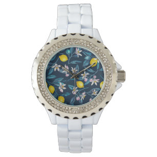 Lemon branches with blossoms and fruit on blue horloge