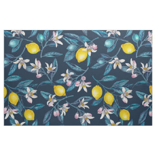 Lemon branches with blossoms and fruit on blue stof