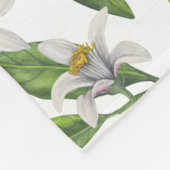Lemon branches with blossoms and fruit on white fleece deken (Hoek)