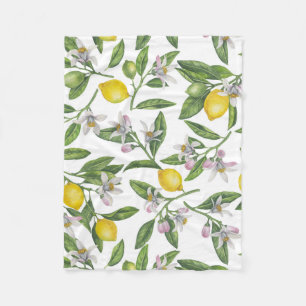 Lemon branches with blossoms and fruit on white fleece deken