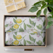 Lemon branches with blossoms and fruit on white tissuepapier (Geschenk)