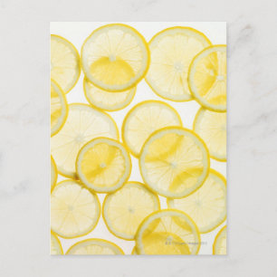 Lemonsegmenten gerangschikt in patroon met achterg briefkaart
