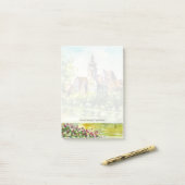 Lente in kleine stad op de rivier post-it® notes (Op bureau)