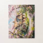 Lentehuisje met bloeiende fruitbomen legpuzzel (Verticaal)